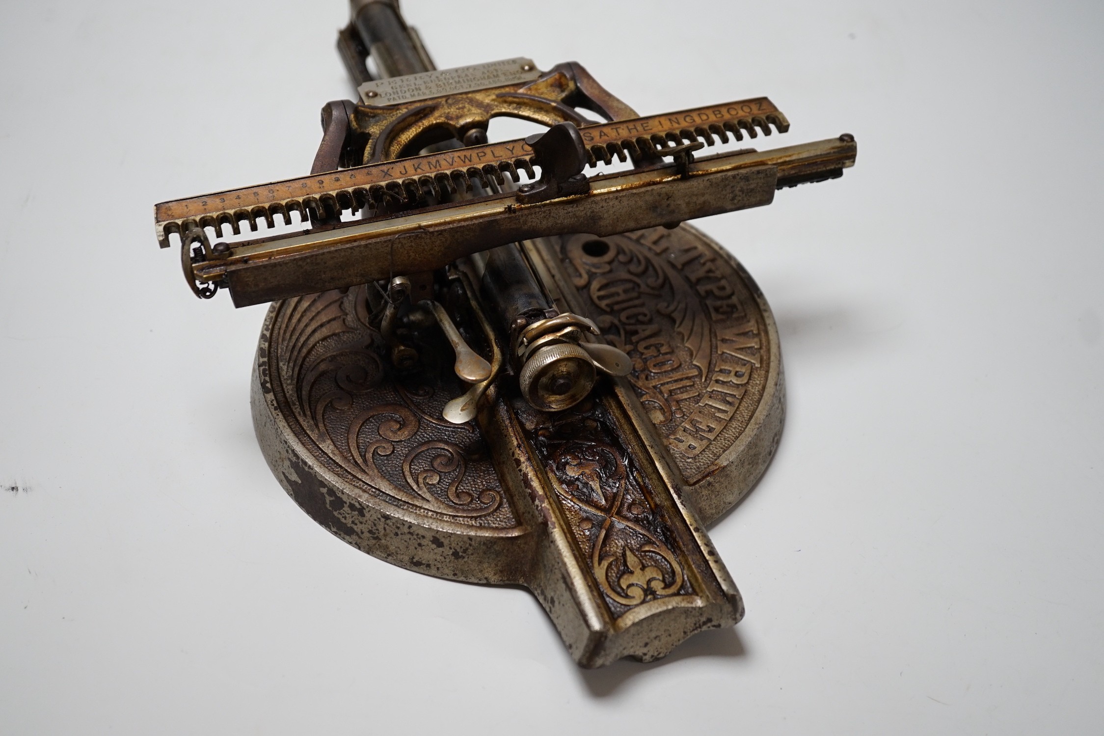 A late 19th century Odell Index typewriter, retailed by Perry & Co.